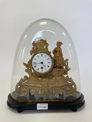 Lot 502 - A gilt metal cased mounted clock with figural...