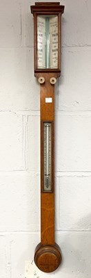 Lot 506 - An oak cased stick barometer by Bryson,...