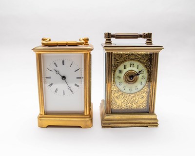 Lot 507 - A gilt brass cased carriage clock, the white...