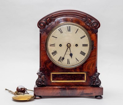 Lot 516 - A Regency mahogany mantel clock, domed top,...