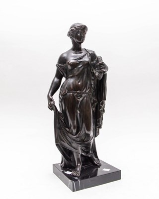 Lot 567 - A bronze figure of a Classical lady, 53cm high,...