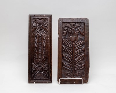 Lot 586 - Two 17th Century carved oak panels, the larger...