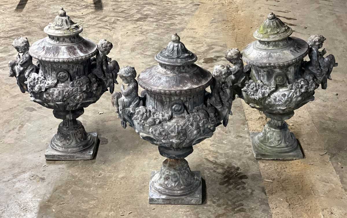 Lot 613 - A set of six lead urns, by H Crowther & Sons,...