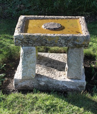 Lot 629 - A stone bird bath on four turned supports,...