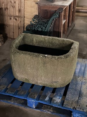 Lot 634 - A D-shaped stone trough, 79cm wide