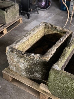 Lot 639 - A D-shaped stone trough, 50cm wide