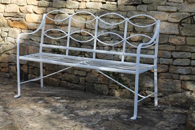 Lot 646 - An iron garden bench with slatted seat and...