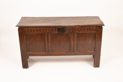 Lot 703 - A 17th Century oak coffer with triple panel...