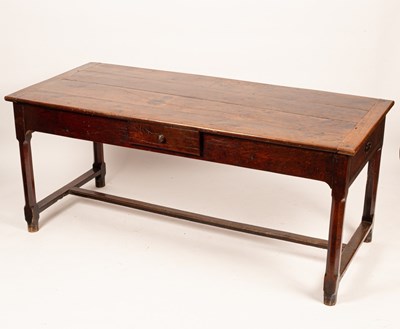 Lot 706 - A refectory type table, the rectangular top on...