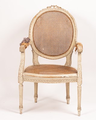 Lot 726 - A cane seated open armchair with oval back and...