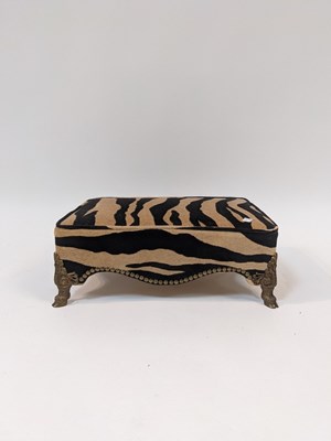 Lot 738 - A rectangular footstool with Zebra print...