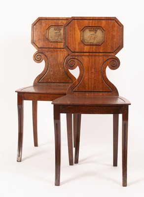 Lot 743 - A pair of George IV mahogany hall chairs, the...