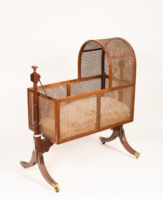 Lot 771 - A Regency mahogany framed cradle on stand, the...