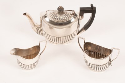 Lot 4 - An Edwardian three piece silver tea service,...