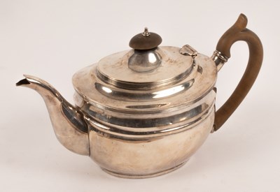 Lot 29 - A George III style silver teapot, Charles...