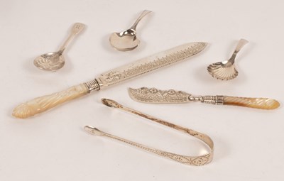 Lot 46 - Three Georgian silver caddy spoons, one floral...