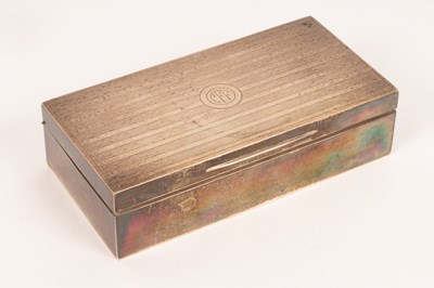 Lot 54 - A silver cigarette box, Mappin & Webb, London...