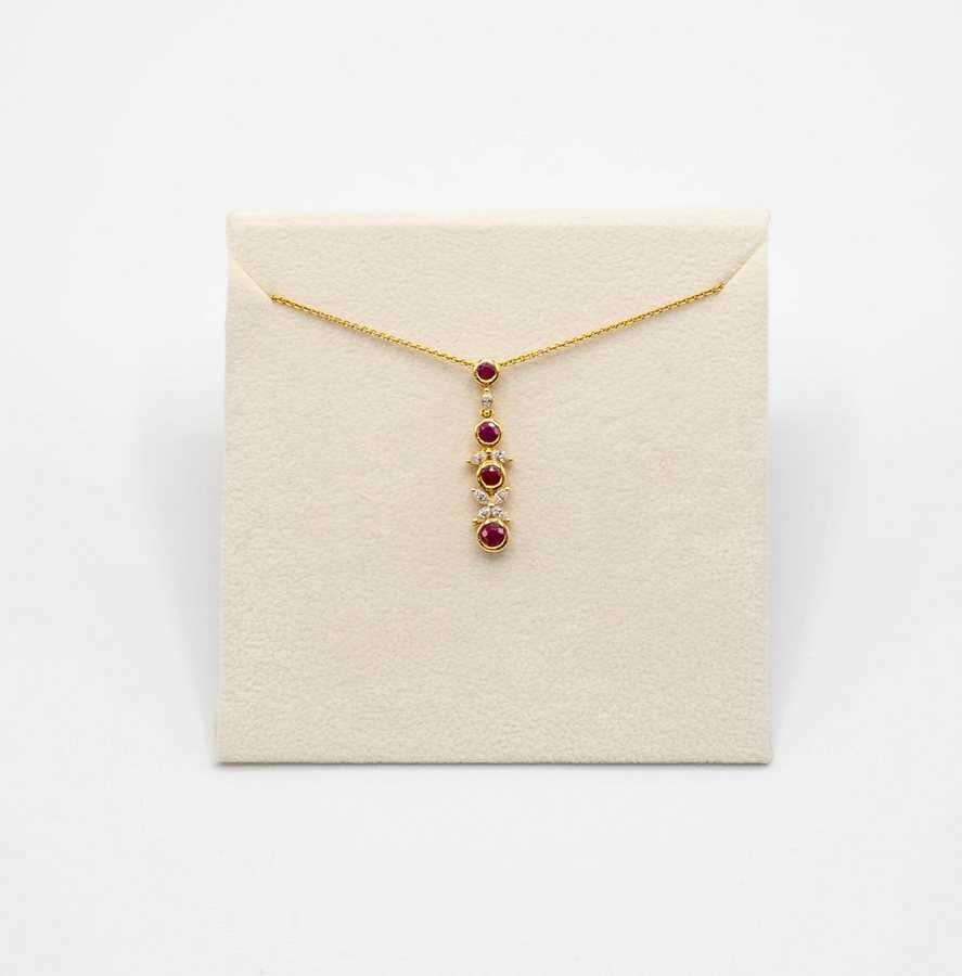Lot 85 - A contemporary ruby and diamond 18ct gold...