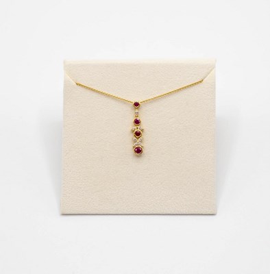 Lot 85 - A contemporary ruby and diamond 18ct gold...