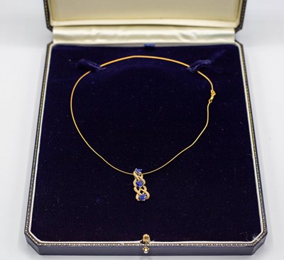 Lot 86 - A contemporary synthetic sapphire and diamond...