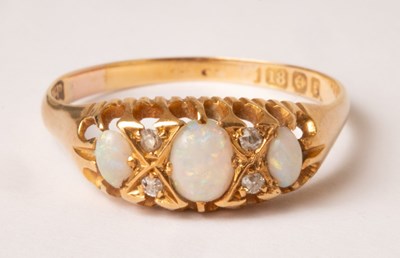 Lot 89 - An Edwardian opal and diamond ring, HWLd,...