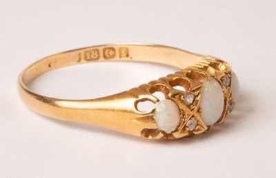 Lot 89 - An Edwardian opal and diamond ring, HWLd,...
