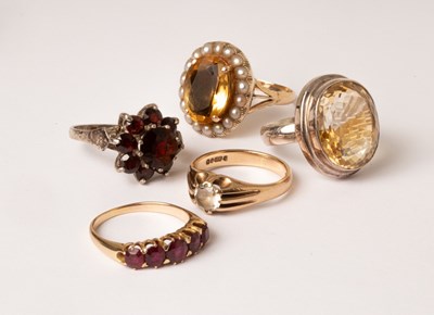 Lot 90 - A ruby five-stone ring, the row of graduated...