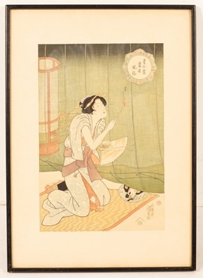 Lot 180 - A Japanese woodblock of a lady kneeling with...