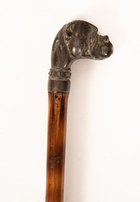 Lot 191 - A cane walking stick, the spelter finial in...