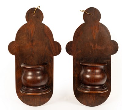 Lot 200 - A pair of Gothic style mahogany wall pockets,...