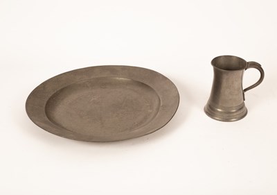 Lot 205 - A large pewter charger, 49cm diameter and a...