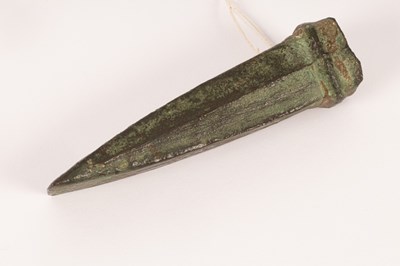 Lot 222 - A Bronze Age socketed and looped axe head,...