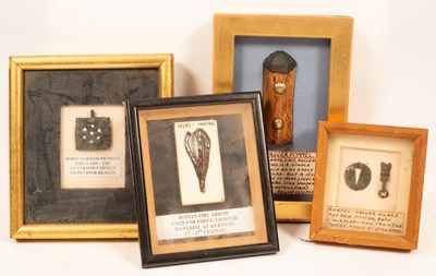 Lot 226 - Four framed trove discoveries, harness mounts,...