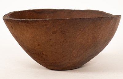 Lot 266 - A large sandstone bowl with a label under...