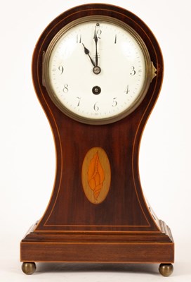 Lot 310 - An Edwardian mahogany mantel clock in a...