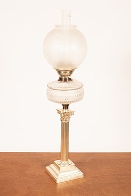 Lot 315 - An oil lamp with etched glass shade and cut...