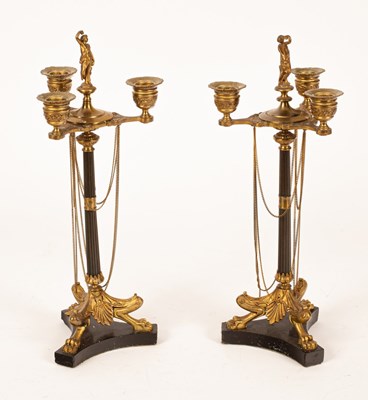 Lot 316 - A pair of Regency style table candelabra, with...