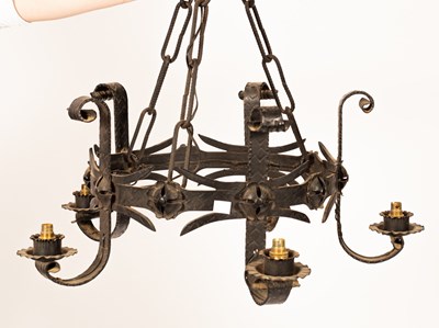 Lot 325 - A cast iron five-branch ceiling light relief...