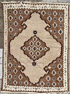 Lot 327 - A North African Kilim carpet, 366cm x 255cm,...