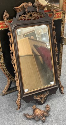 Lot 414 - A stained mahogany fretwork mirror with parcel...