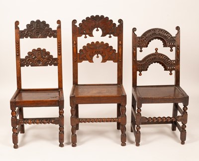 Lot 415 - Three carved oak Yorkshire chairs, with...