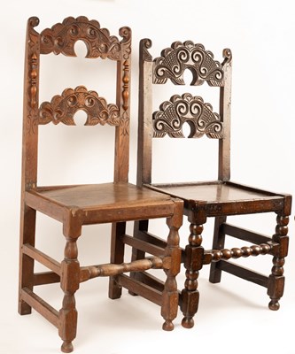 Lot 418 - Two carved oak Yorkshire chairs, with panelled...