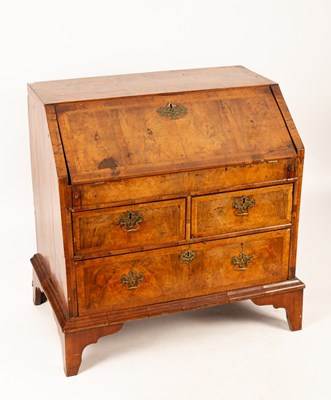 Lot 419 - An 18th Century walnut bureau, the hinged lid...