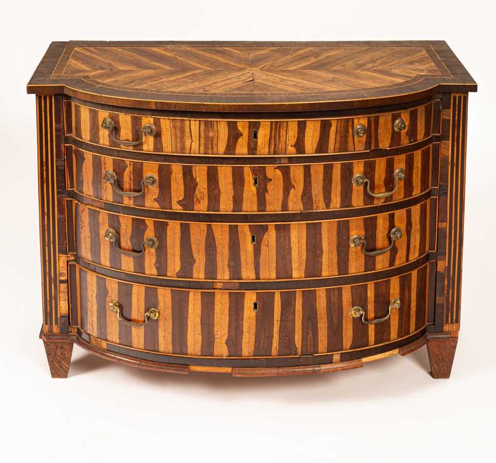 Lot 434 - A Dutch laburnum chest of drawers, circa 1800,...