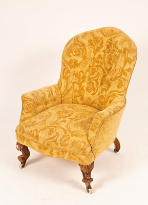 Lot 446 - A Victorian upholstered armchair on cabriole legs