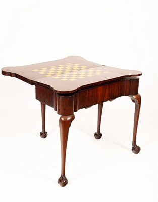 Lot 451 - A George II style mahogany games and work...