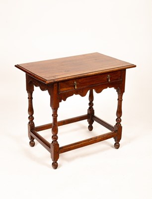 Lot 453 - An 18th Century oak side table with frieze...