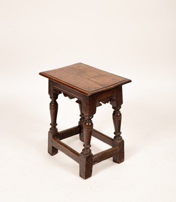 Lot 454 - A Charles II oak joint stool, with later top,...