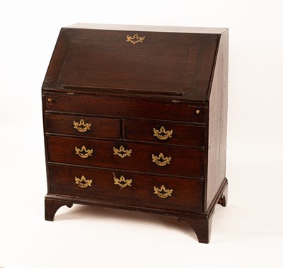 Lot 456 - A George II oak bureau with fall-front...