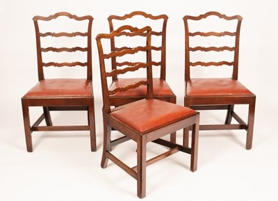 Lot 469 - A set of four George III mahogany ladderback...